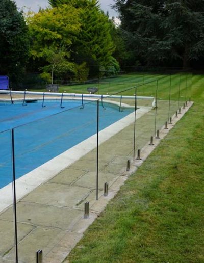 Pool protected by Glass pool barrier