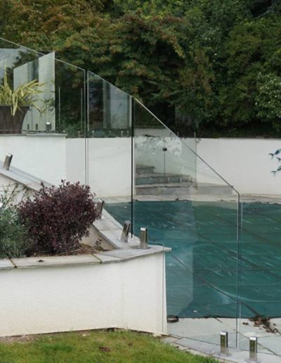Bespoke angled frameless glass pool fence