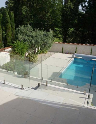 Fall prevention frameless glass barriers