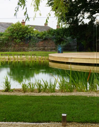 Almost invisible frameless glass swimming pond fence